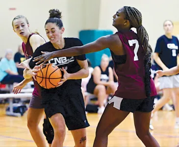 CNB Bank cashes in on 3-peat in Alumni Division final